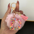 Pink Faux Fur Pompom Letter Charm Keychain with Confetti Resin view 2