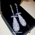 Clear Faceted Teardrop Earrings with Crystal Bow Tops view 4