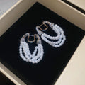 Silver Tone Layered Pearl Horseshoe Huggie Earrings view 3