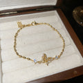 Gold Open Rings Peach Stone And Butterfly Chain Bracelet view 7