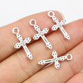 Dotted Cross Charm in a Bright Antique Silver Tone Finish view 1