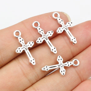 Dotted Cross Charm in a Bright Antique Silver Tone Finish