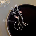 Silver Tone Crystal Floral Bow Chain Drop Earrings view 3