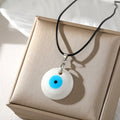 Round Resin Evil Eye Pendant Necklaces on Black Cords view 3
