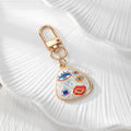 Gold Tone Evil Eye Printed Shell-Look Lobster-Clasp Charms in Six Designs view 4
