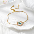 Gold Tone Peacock Feather Evil Eye Slider Bracelets in Nine Shapes view 7