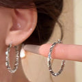 Silver Tone Textured Hoop Earrings in Three Designs view 2