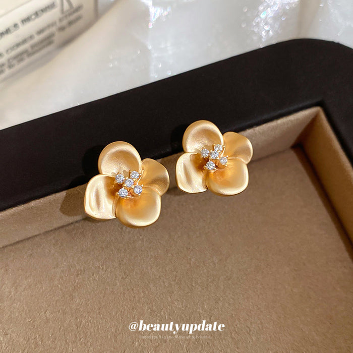 Gold Tone Flower Stud Earrings With Clear Crystal Centers
