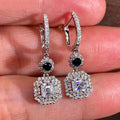 Black Round Stone and Square Halo Long Drop Earrings in Silver Tone view 1