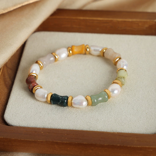Display view of freshwater pearl and multicolor stone bracelet in main image 2.