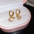 Gold and Silver Tone Crescent Moon and Star Hoop Earrings view 7