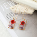 Gold Tone Rectangular Clear Resin Pressed Flower Long Wire Earrings view 4
