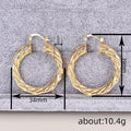 Gold Tone Wavy Concave Twisted Side Hoop Latch Earrings view 4