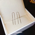 Minimal U Shaped Threader Earrings In Silver And Gold view 4