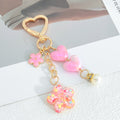 Pink Heart Clasp Keychain with Iridescent Hearts and Glitter Flower Charm view 7