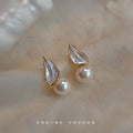 Gold Tone Translucent Leaf And White Pearl Stud Earrings view 1