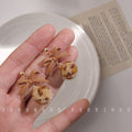 Tan Leather Bow Leopard Fur Pom Drop Earrings Pair view 6