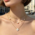 Four Shell Flower Wrapped Bead Natural Shell And Pearl Necklaces view 3