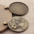 Large Oval Cabochon Settings in Two Antique Finishes view 2