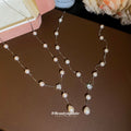 Silver Tone Faux Pearl Station Necklace With Flower Drop Pendant view 2