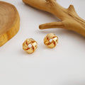 Twelve Gold Tone Sculptural Knot and Hoop Earring Collection view 3