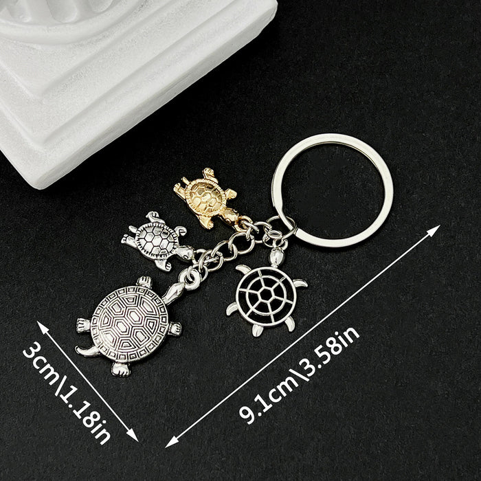 Silver Tone Turtle Family and Starfish Keychain with Metal Hardware