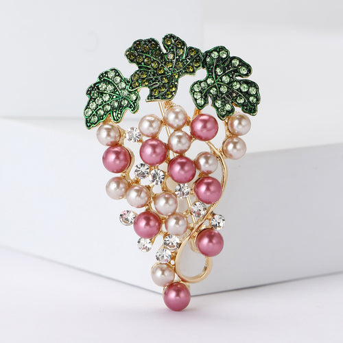 Pink and cream pearl grape brooch with green rhinestone leaves