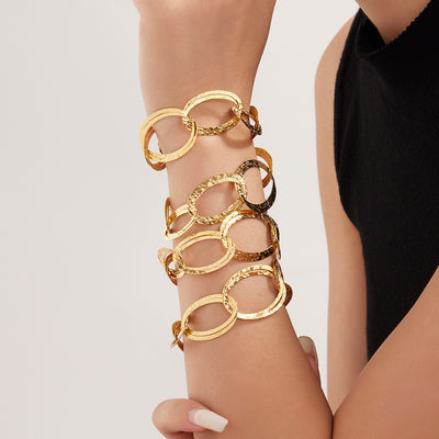 On-wrist view of textured oval link bracelets in main image 1.