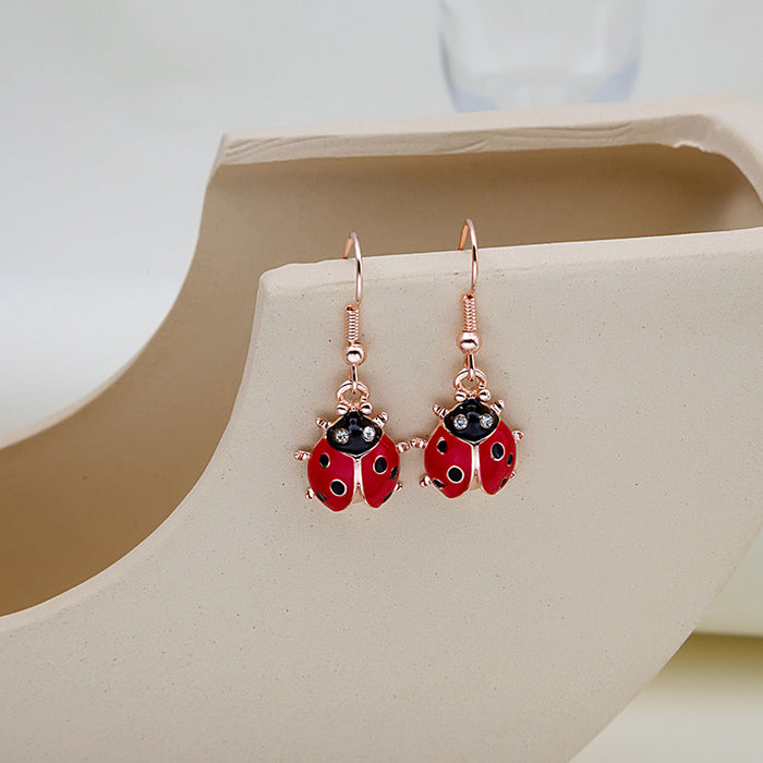 Red Ladybug Gold Tone Hook and Clip Dangle Earrings