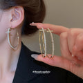 Crystal Cross Hoop Earrings in Gold and Silver Tone view 1