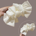 Oversized Layered Mesh Bow Hair Claw in Black or Ivory view 7