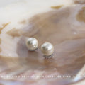 Cream Pearl Stud Earrings With Silver Crescent Pavé Base view 4