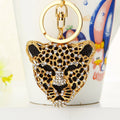 Gold Leopard Head Keychains with White Pink and Gray Rabbit Fur Poms view 6