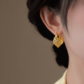 Twisted Open Hoop Earrings in Gold and Silver Tone view 4