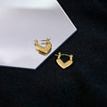 Gold Tone Solid Heart Huggie Hoop Metal Earrings Pair view 3