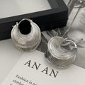 Layered Wire Texture Hoop Earrings In Two Metallic Tones view 3