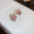 Pink Heart And Crystal Bow Stud Earrings With Polished Metal Tone Details view 2