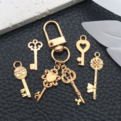 Yellow assorted shape charms shown in a close-up product view