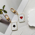 Gold Tone Enamel Heart and Spade Playing Card Clip Keychains view 1