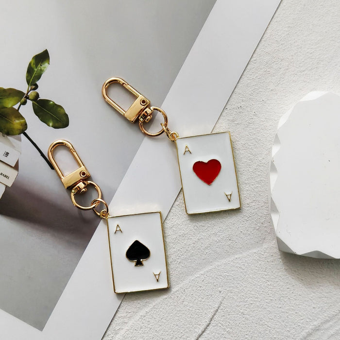 Gold Tone Enamel Heart and Spade Playing Card Clip Keychains