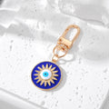 Gold and Silver Tone Deep Blue Evil Eye Clip Keychains view 2