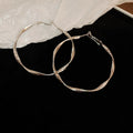 Multi Hoop and Twisted Hoop Earrings in Eight Metallic Styles view 11