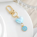 Blue Pearlescent Heart And Round Initial Letter Keychain view 10