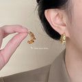 Gold and Silver Ribbed Wavy Geometric C-Shape Stud Earrings view 2