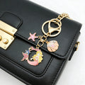 Pink or Blue Mermaid Starfish and Shell Keychains with Metal Hardware view 1