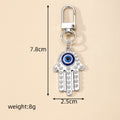 Gold and Silver Tone Openwork Hamsa Evil Eye Clip Keychains view 4