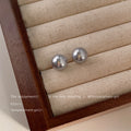 Pale Purple Round Pearl Stud Earrings In Two Graduated Sizes view 7