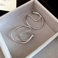 Silver Tone Open Heart Ear Cuffs With Polished Metal Details view 6