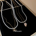 Pearl Like Bead Layered Necklace With Bow Charms Beaded Jewelry view 4