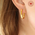 Flat Oval Huggie Hoop Earrings Gold And Steel Tone Metal view 3